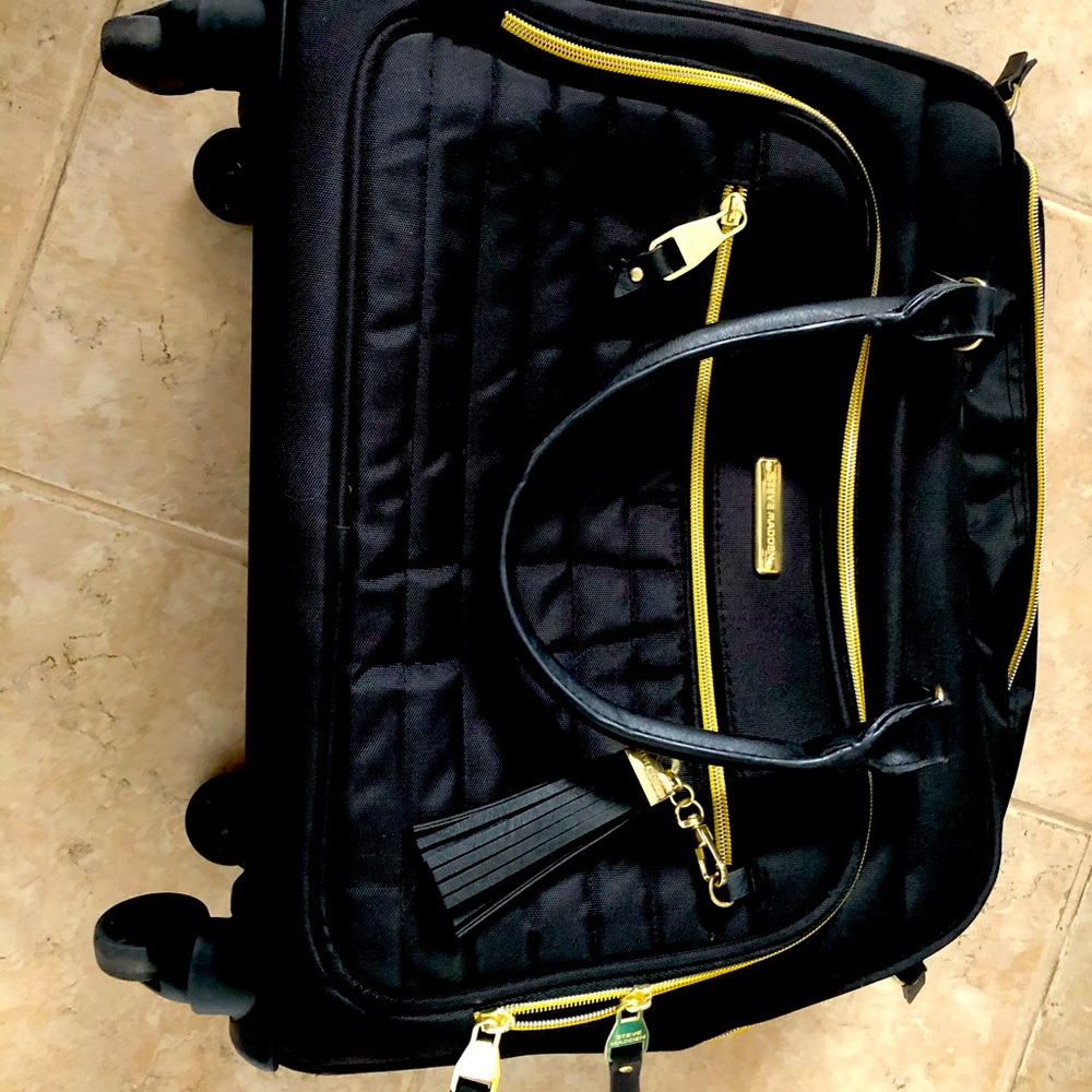 Steve Madden Roller Luggage Bag